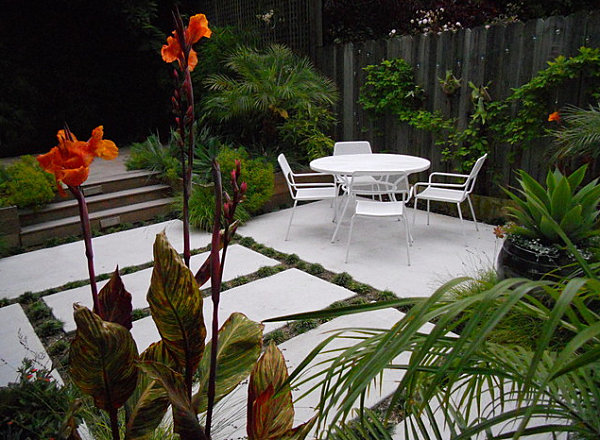 Pathway stones and a patio in a landscaped backyard