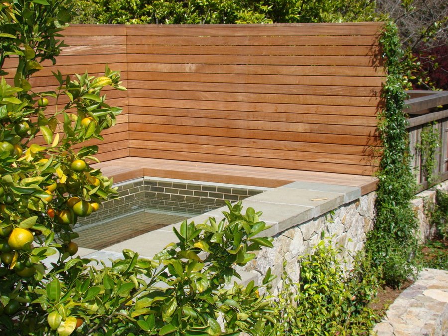 Privacy fence surrounding a custom-built spa