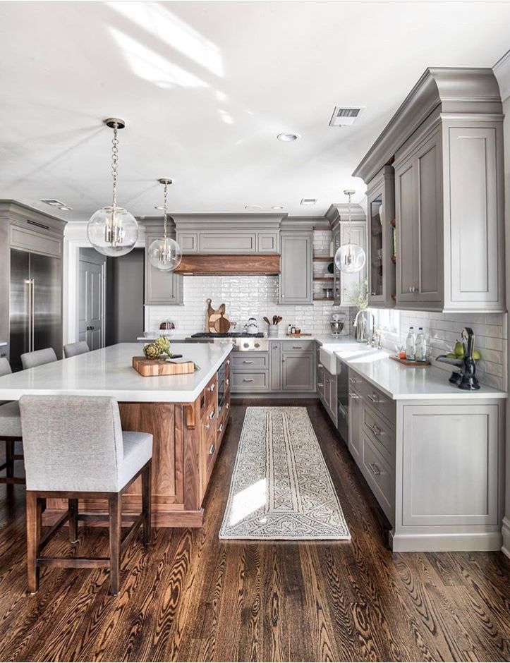 A Kitchen Using Gray and White with Wood Accent