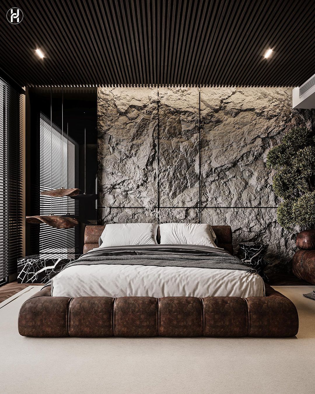 A large planter anchors a modern bedroom in grey and black