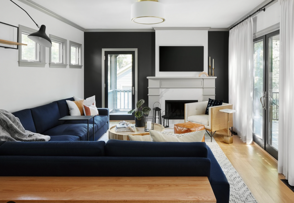 A Narrow Long Living Room with the Fireplace Away from Center