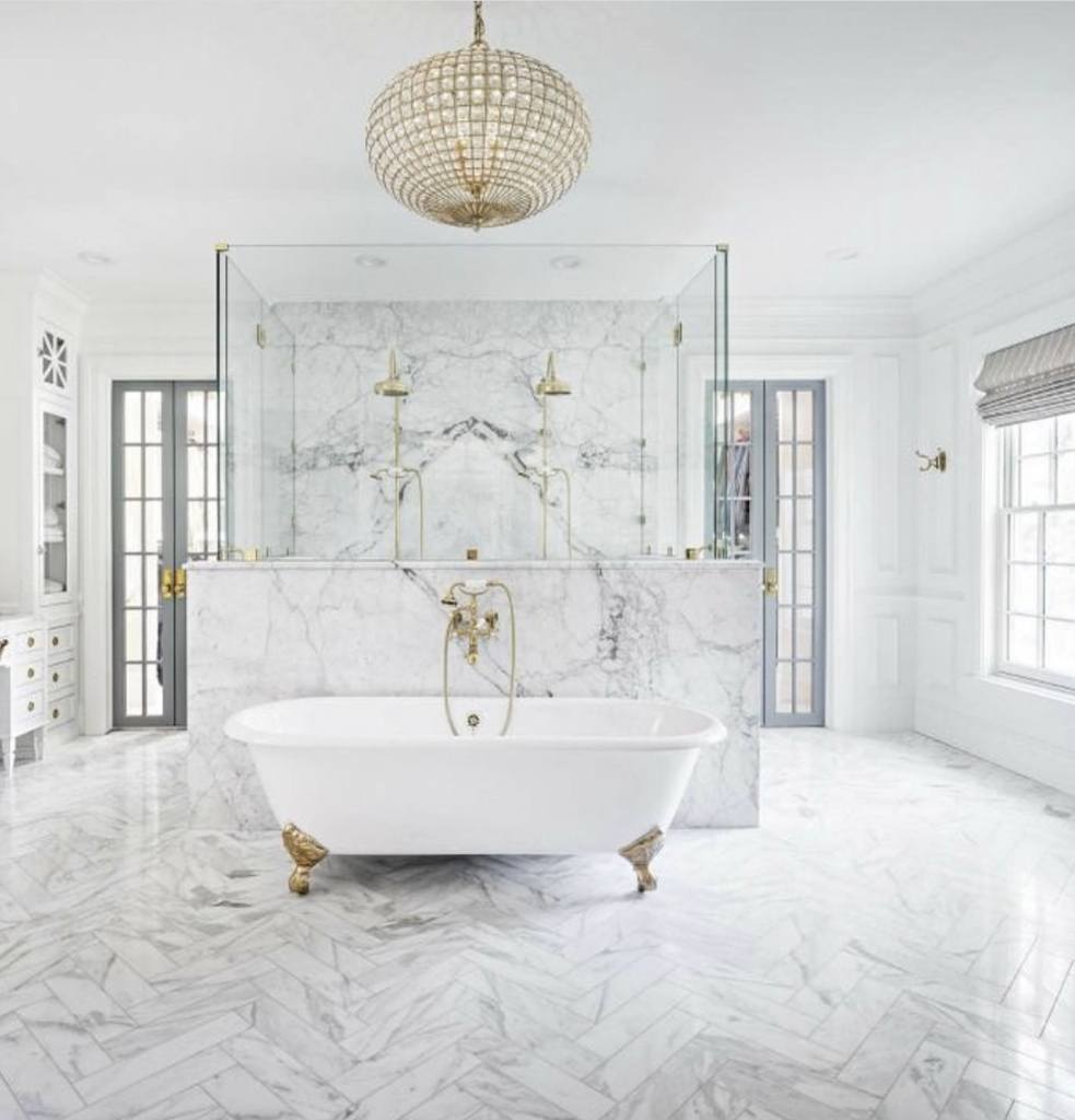 A Sphere-Shaped Gold Chandelier for the White Vanity Bathroom