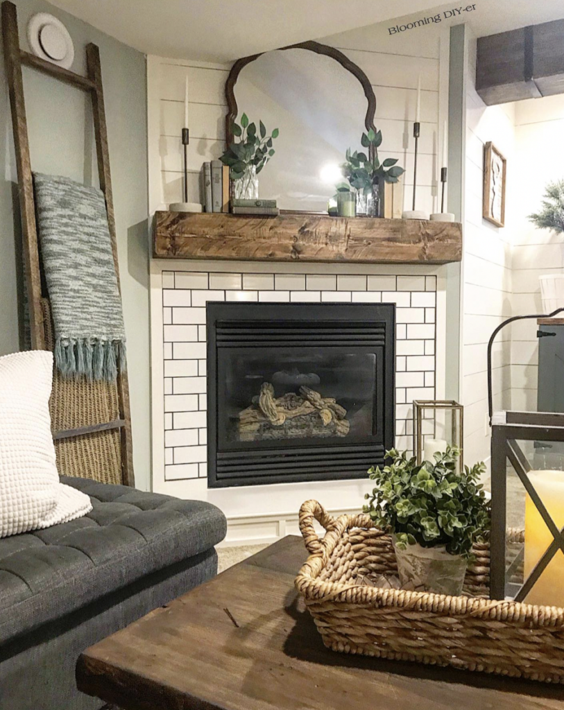 A surround covered with white subway tile