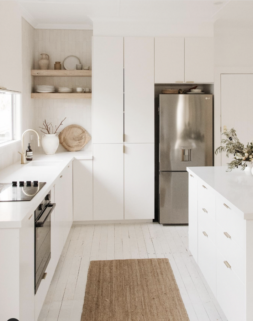 Above the Fridge, a Modern White Cabinet