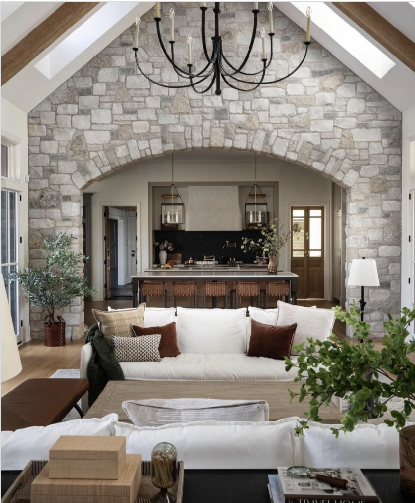 An Open Kitchen with a Stone Wall