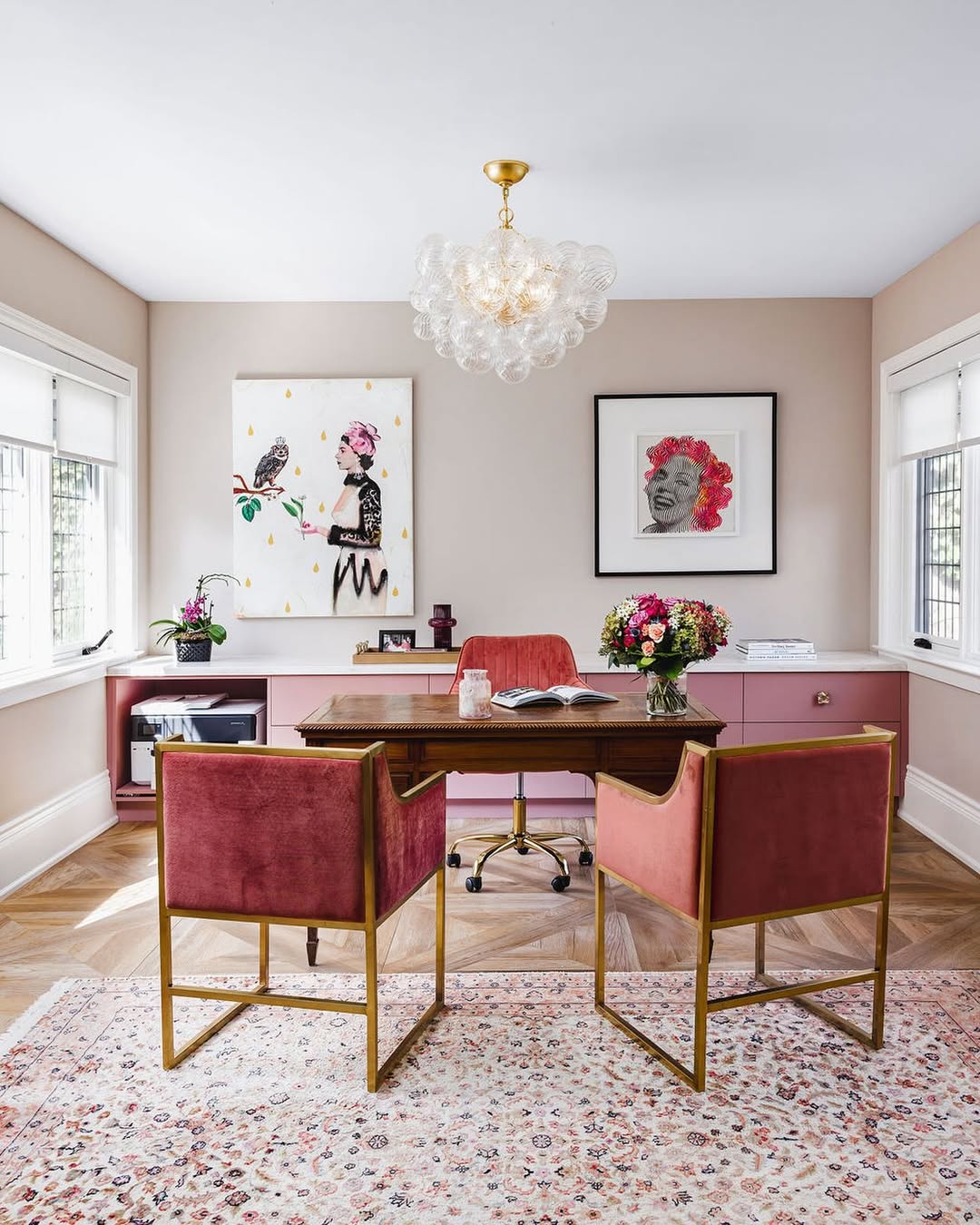 Art-Filled Home Office with Dusty Rose Velvet Chairs and Brushed Gold
