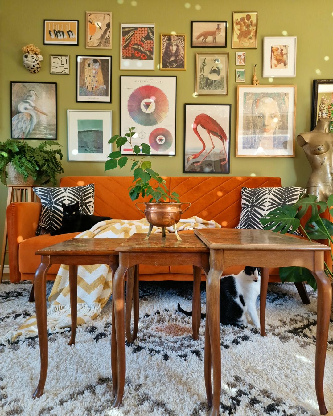 Art-filled walls in a vintage eclectic living room