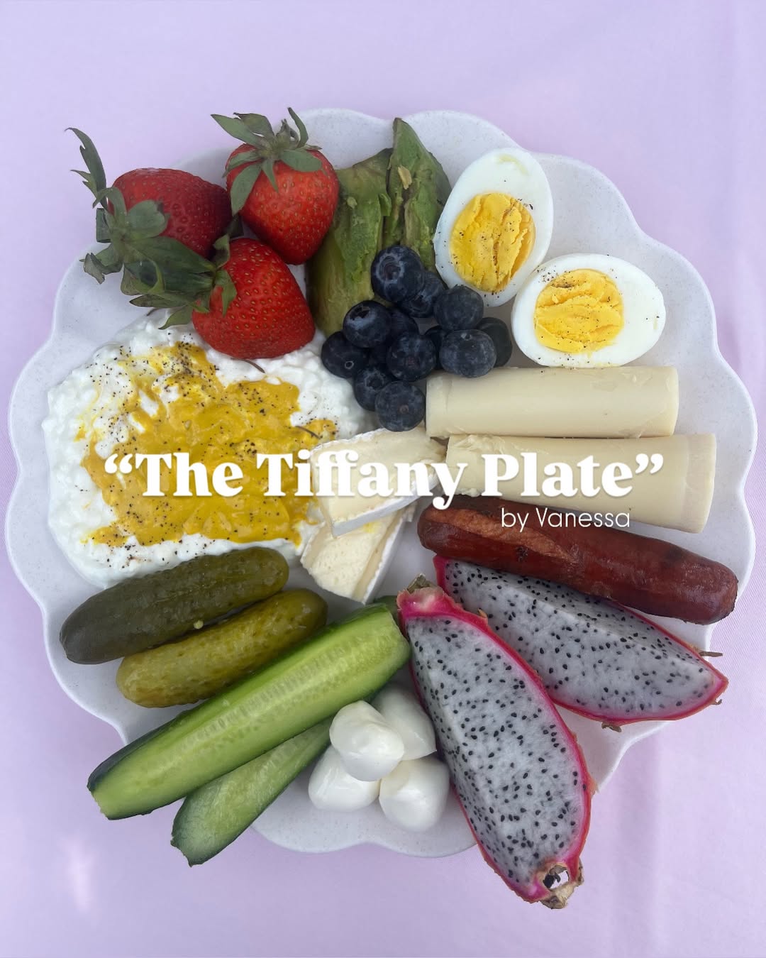 Beautiful Tiffany Plate on scalloped plate with avocado, string cheese, brie, dill pickles, and dragon fruit