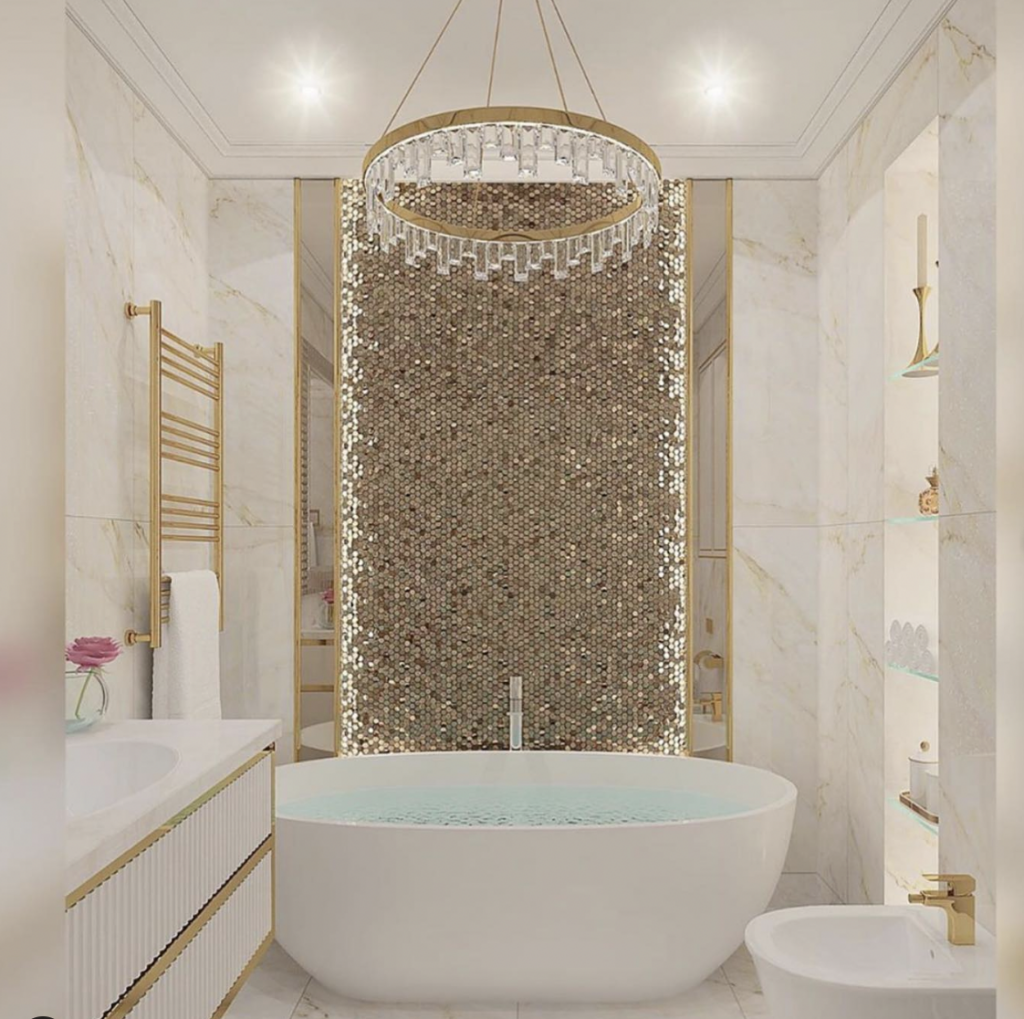 Bathroom with Gold Accents and a Crystal Chandelier