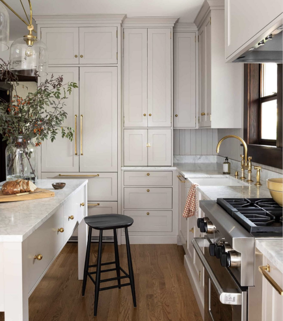 Beige Cabinets with White Elements and Gold Hardware