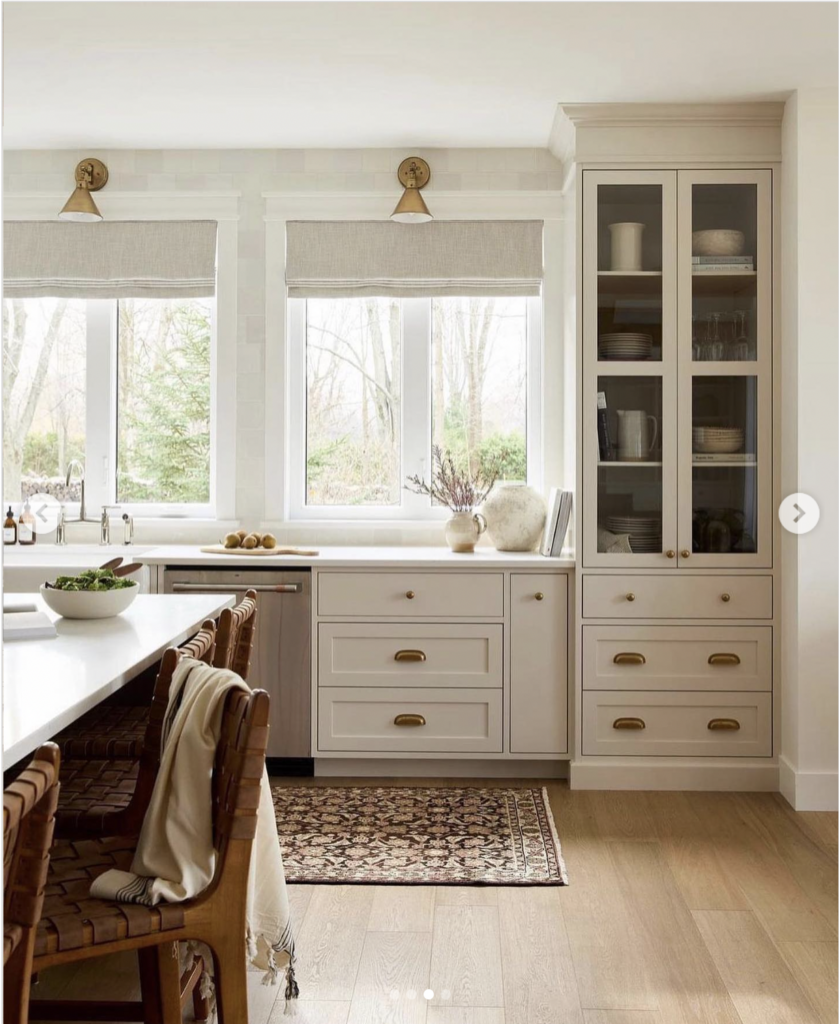 Beige Glass Cabinets with Gold Hardware