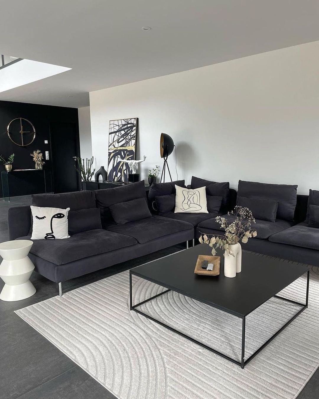Black Couch with Artistic and Textural Play