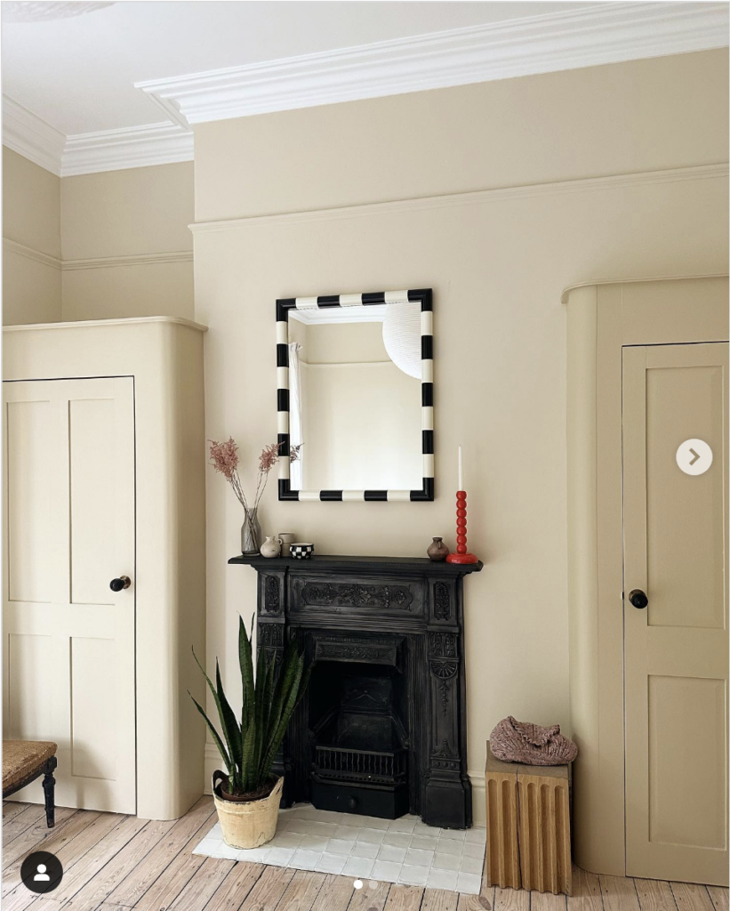Black Decor for a Fireplace with Mirror