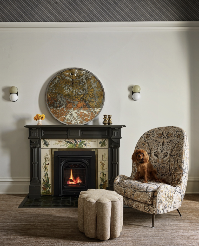 Black Fireplace and Small Black Wall Sconce