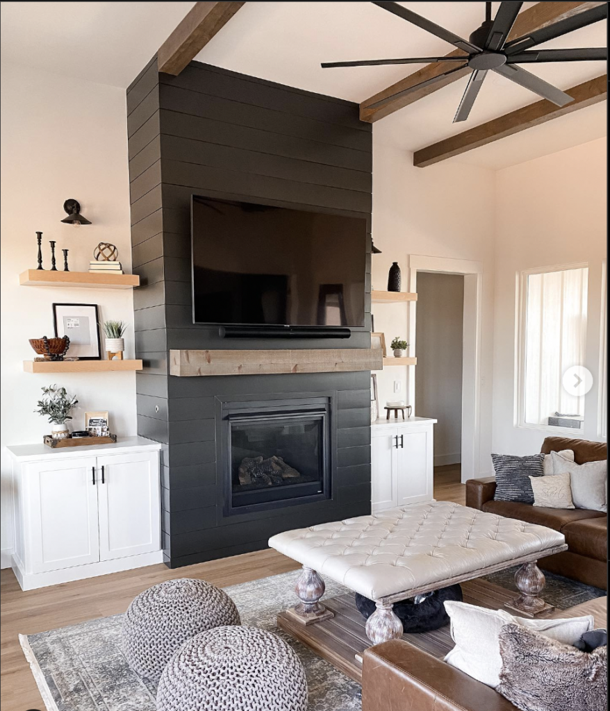 Black Fireplace with Grey Rug