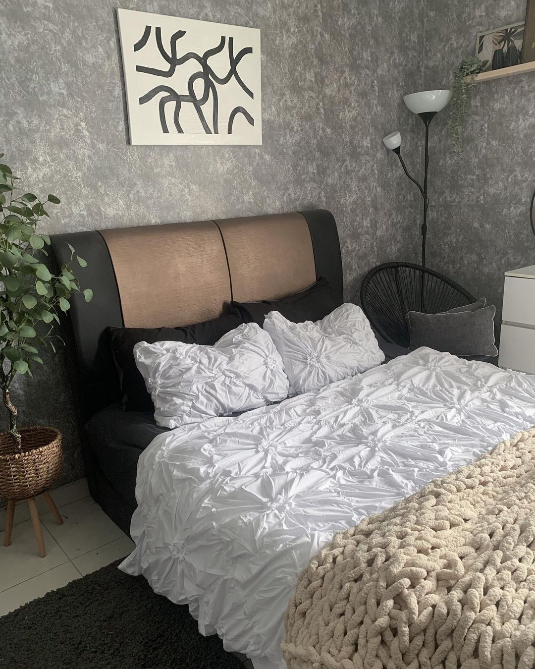 Black Grey Bedroom with a Beige Throw