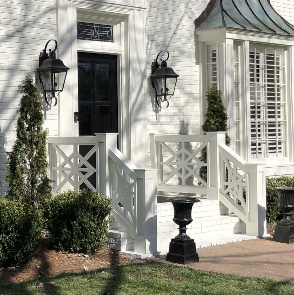 Black Lighting on a White Brick Home