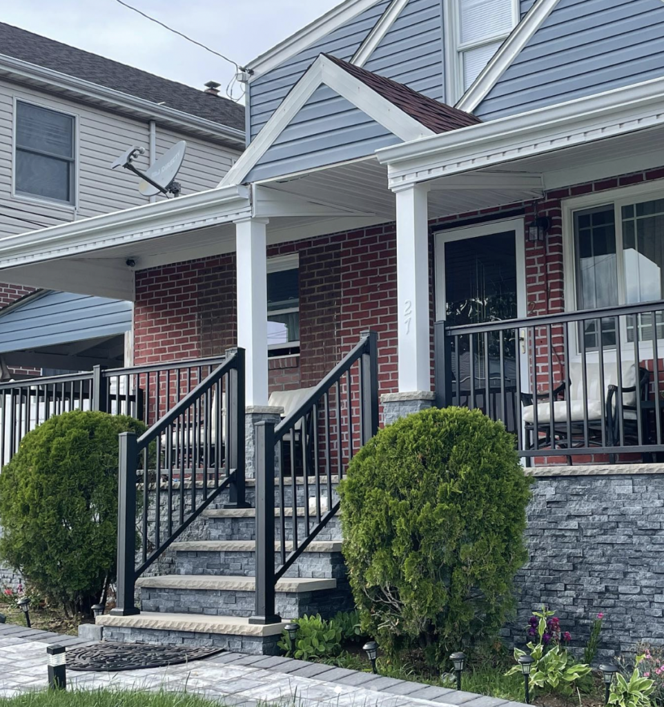 Black Railing on Red Brick
