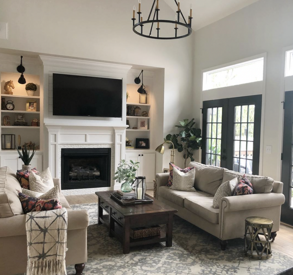Black Sconces in Fireplace Side Built Ins