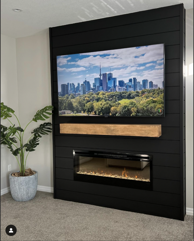 Black Shiplap Fireplace with Beige Carpet