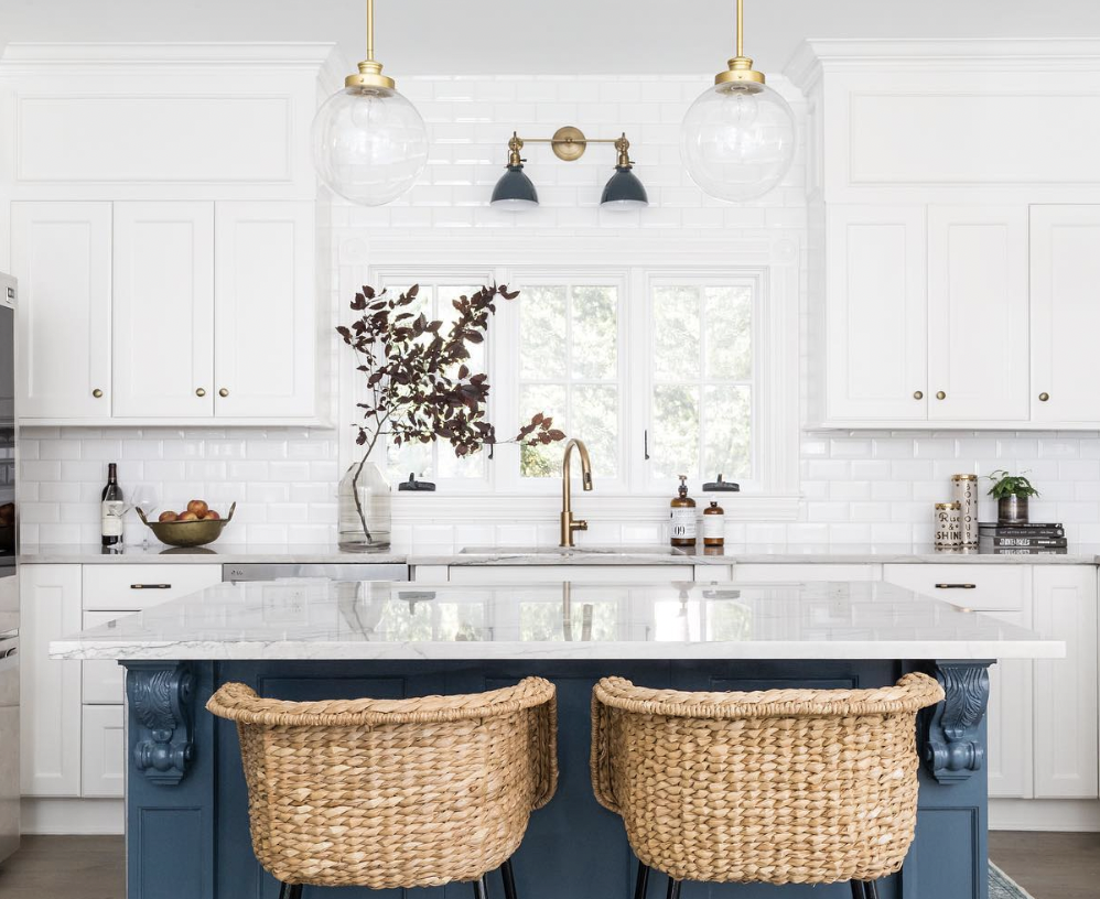 Blue Kitchen Island with Stainless Steel Appliances