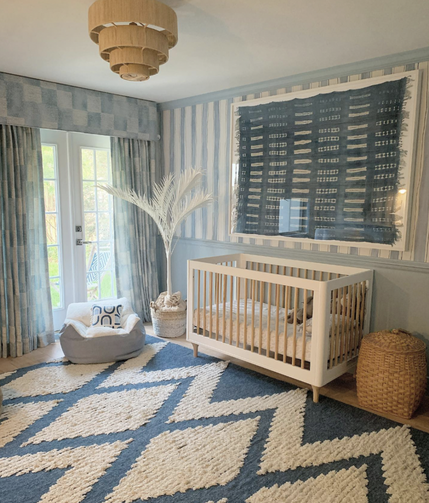 Blue Toddler Room with a White Crib
