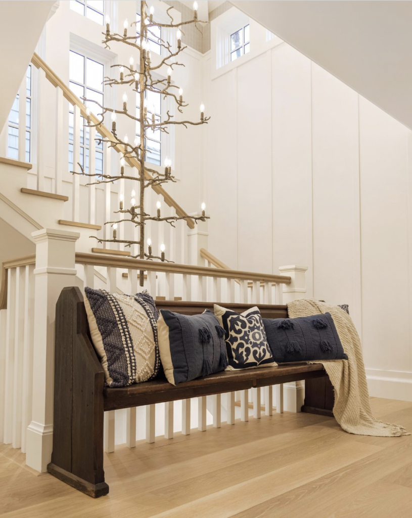 Blue Trow Pillows on a Dark Wood Bench