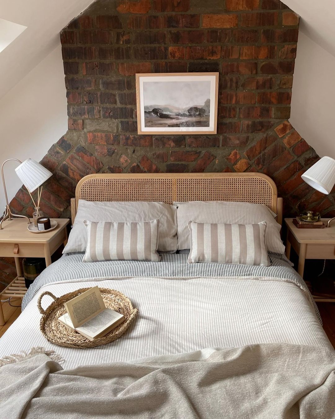 Brick and Wicker in an Industrial Attic Bedroom