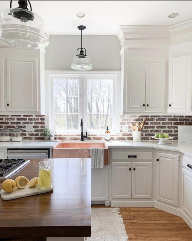 Brick Backsplash and White Cabinetry