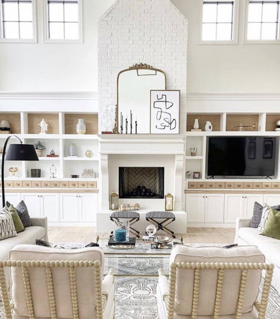 Brick Fireplace Wall Flanked by Built-Ins