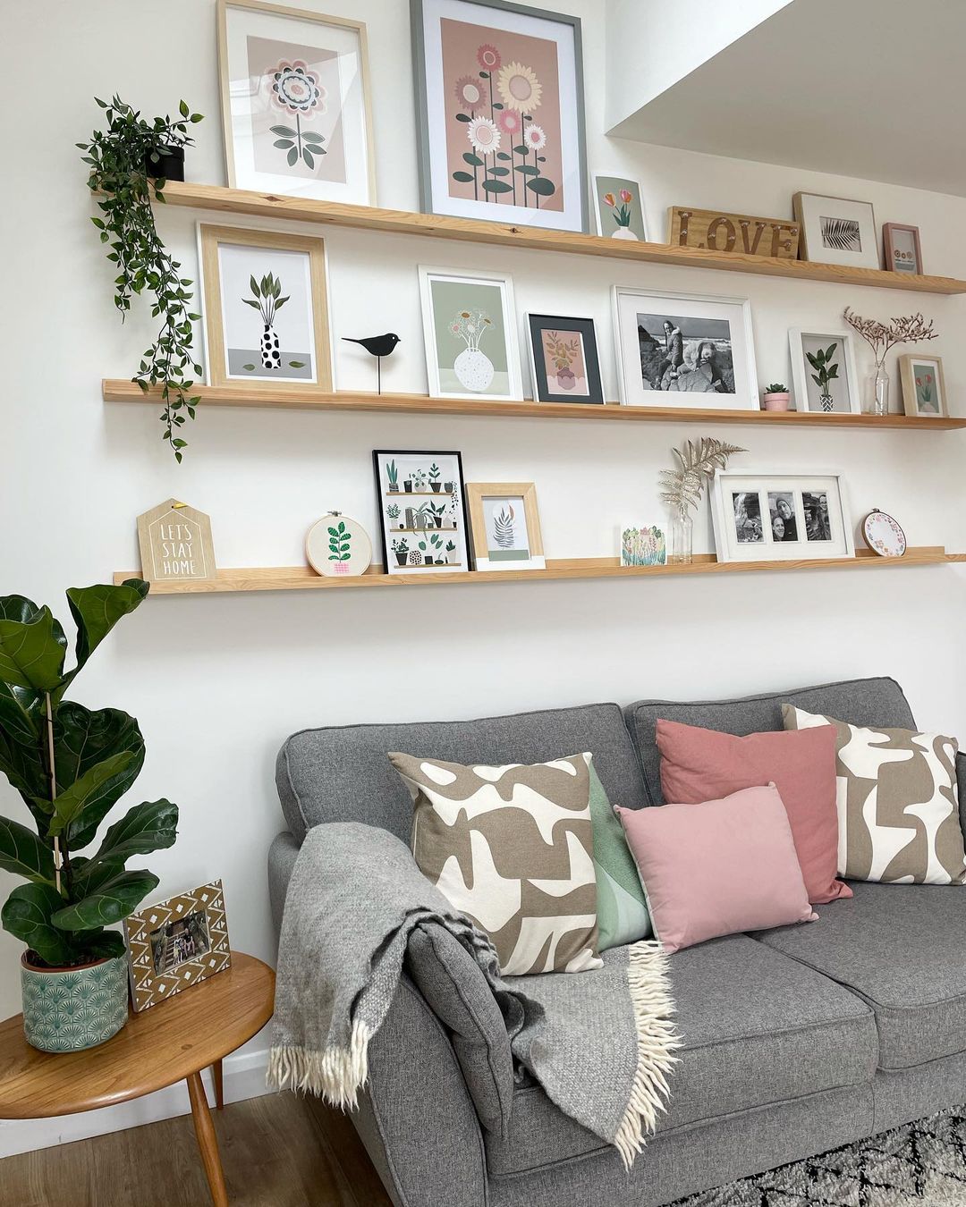Bright Living Room with Layered Picture Ledge Display