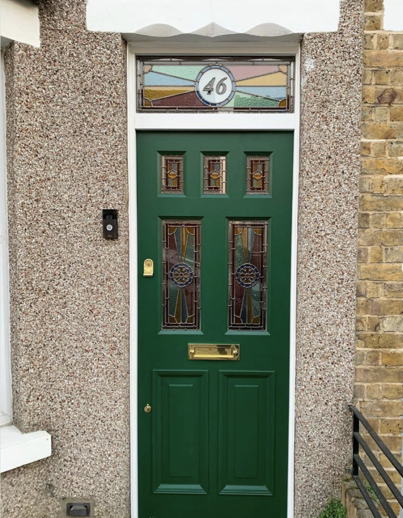 Brown Exterior with a Hunter Green Entry Door