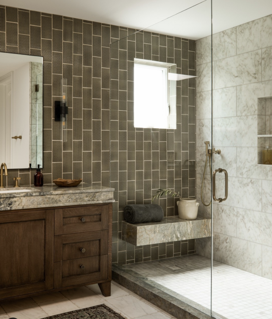 Brown Tiled Accent wall With Bench In Shower