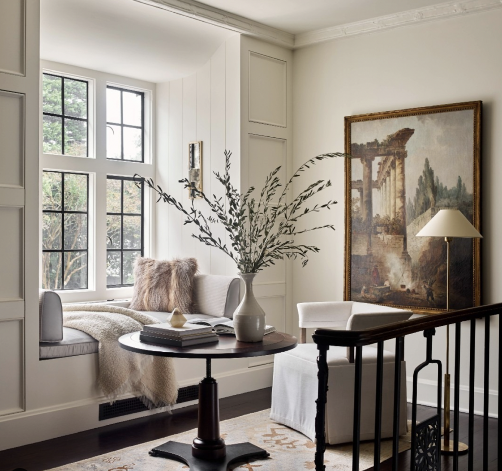 Built-In Bench by a Window on a Black Staircase Landing