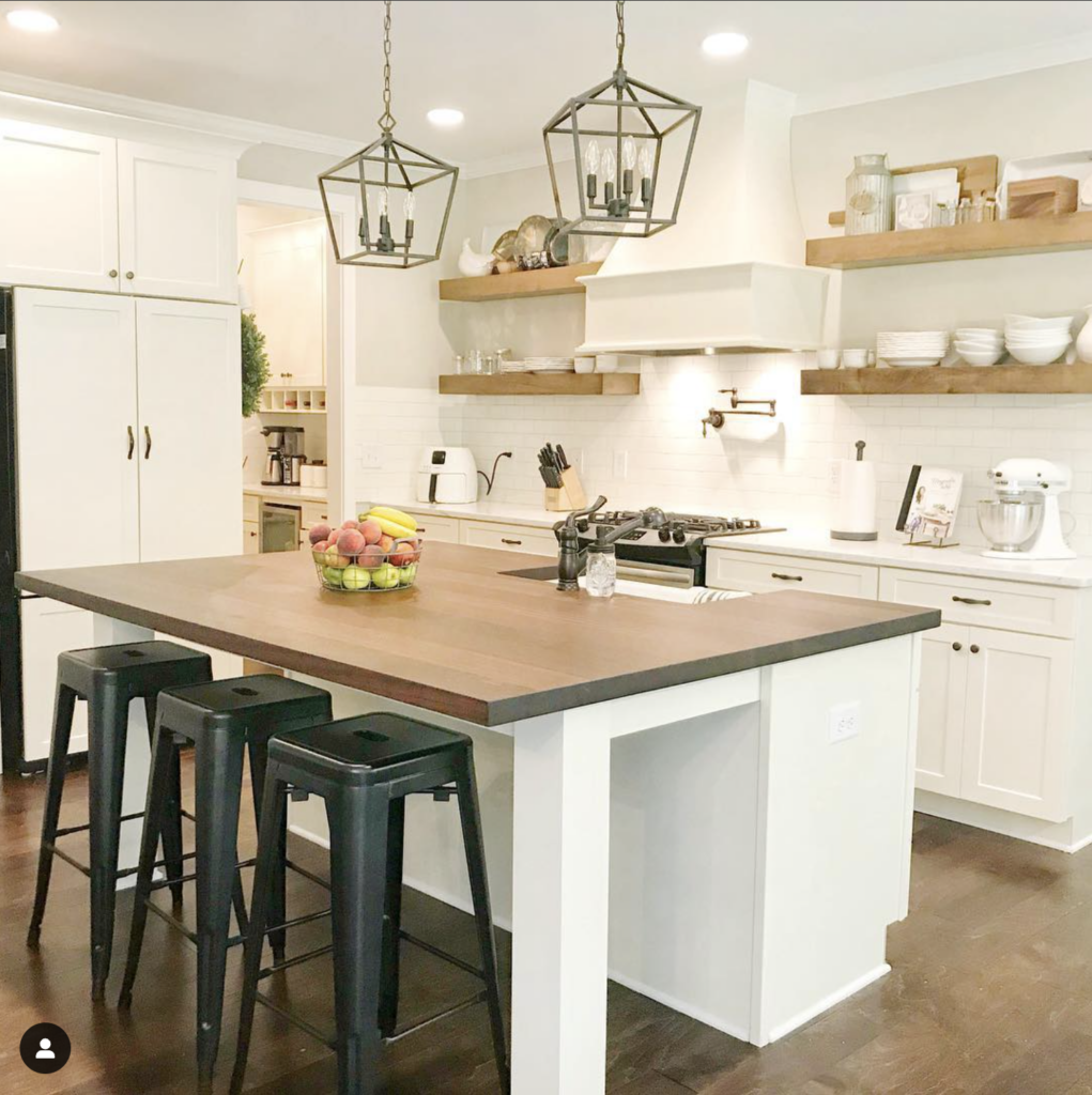 Butcher block topped white kitchen cart