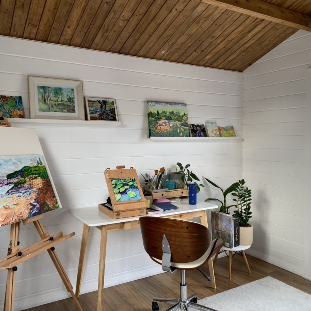 Cabin-Calm Studio with Soft Wood Tones and Nature Views