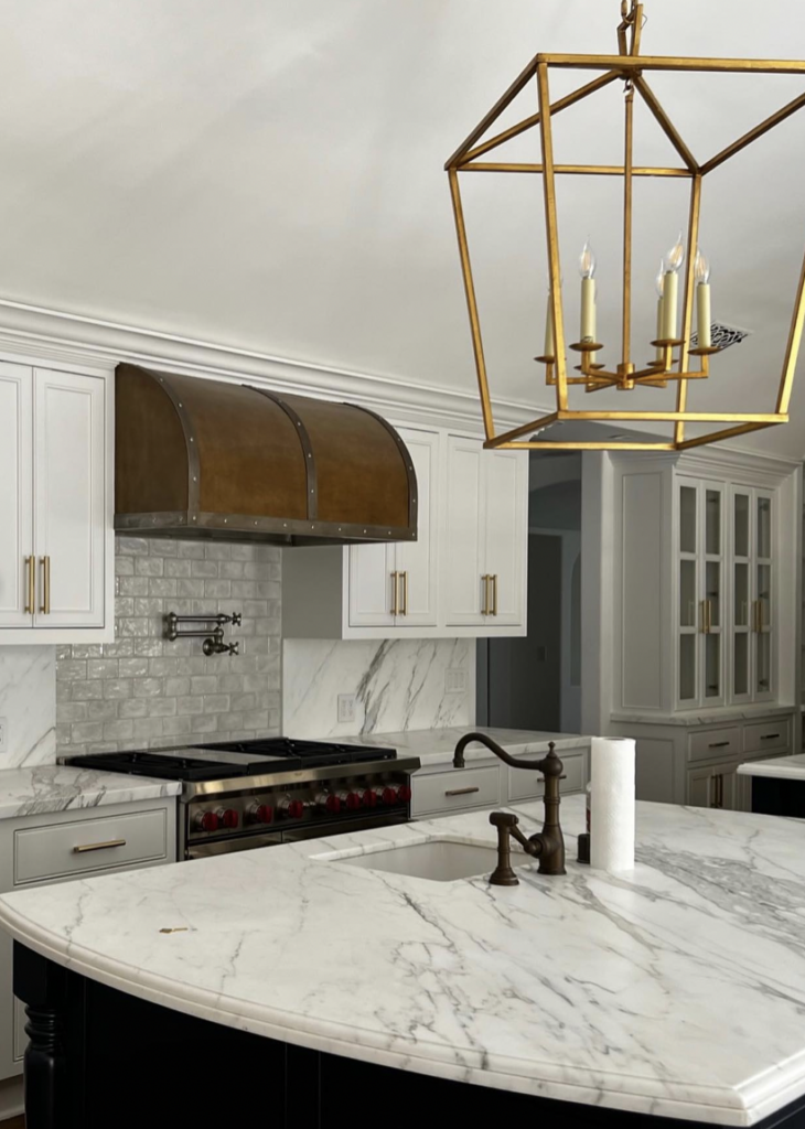 Candle-Style Chandelier in Gold Over the Sink