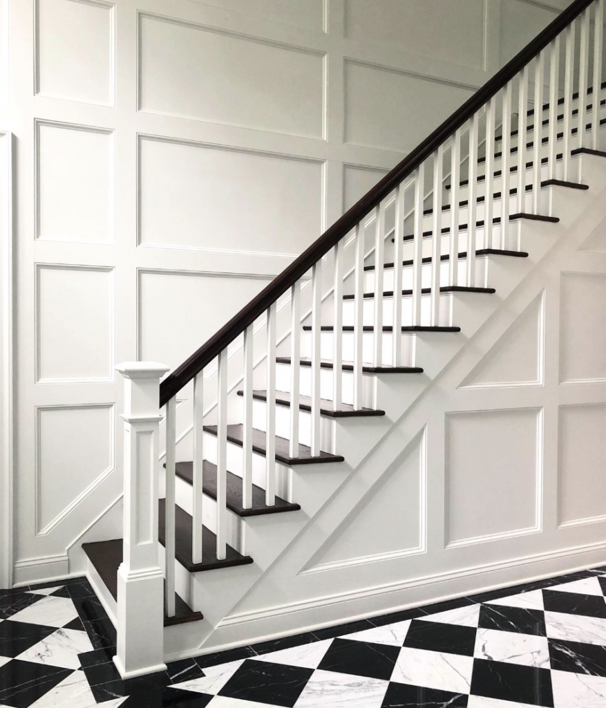 Checkerboard Floor and Black Stairs