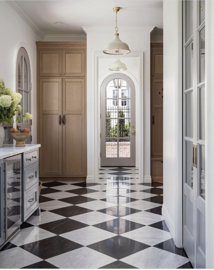 Black And White Checkboard Flooring And White Farmhouse Trim
