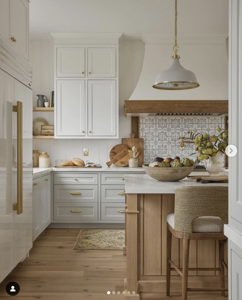 Colorful Floral Backsplash and Beige Cabinets
