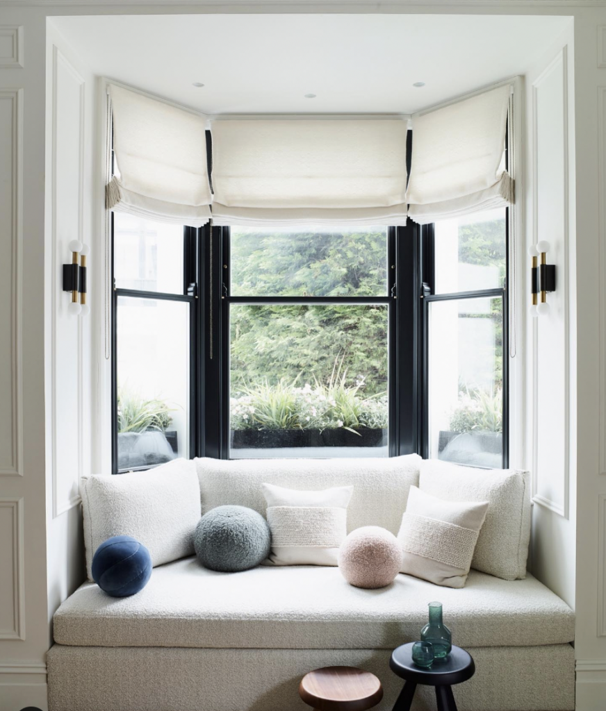 Cozy Nook by a Bay Window with White Blind