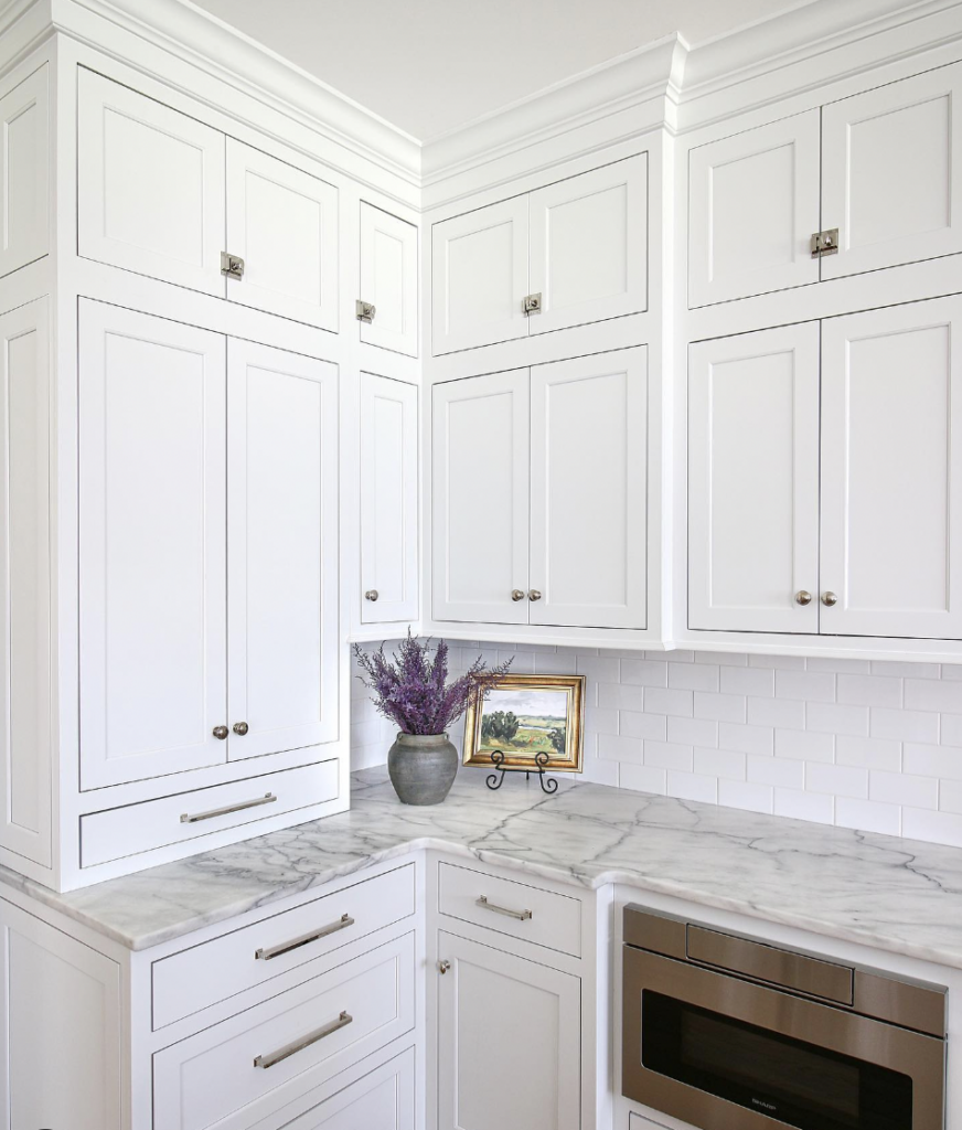 Crown-Molded L-Shaped Kitchen Cabinets