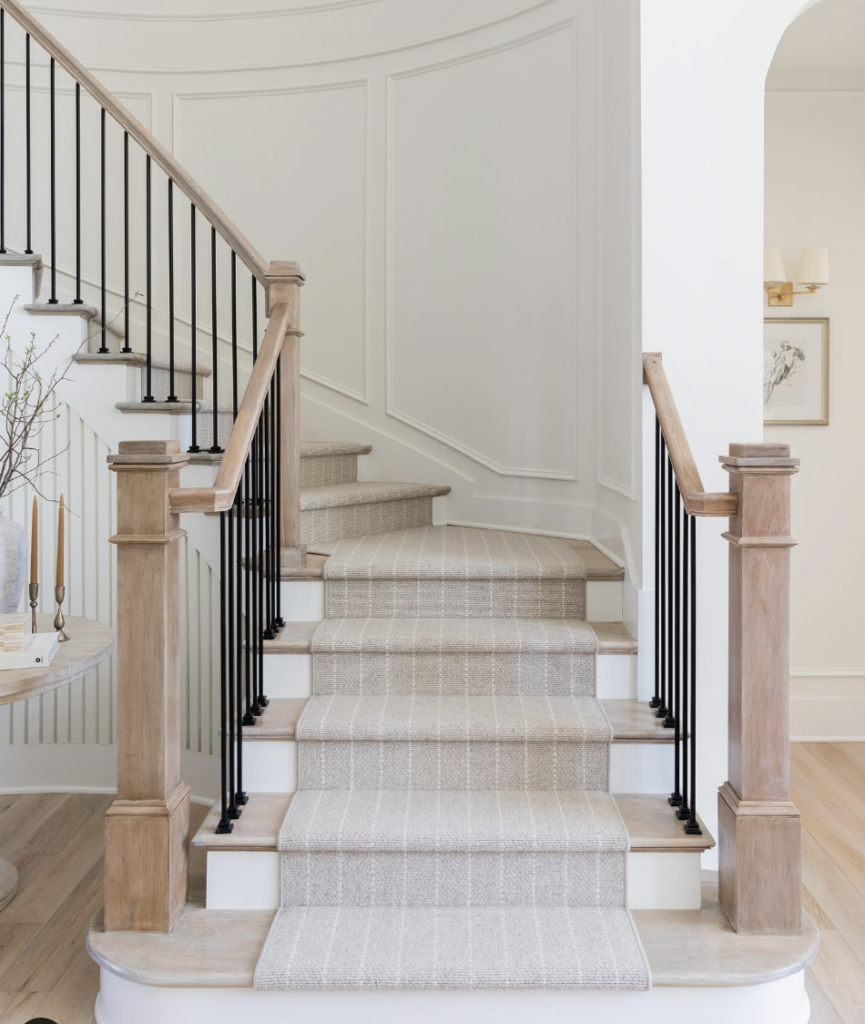 Curved Staircase with Black Railing