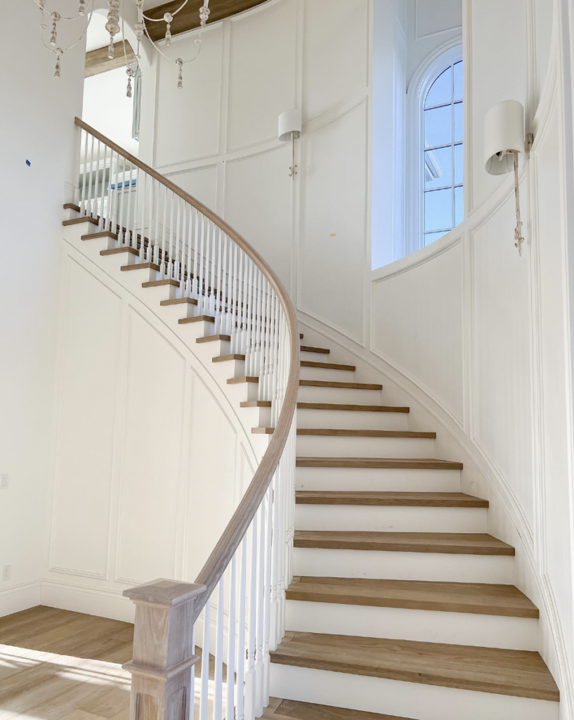 Curved Stairway with White Risers