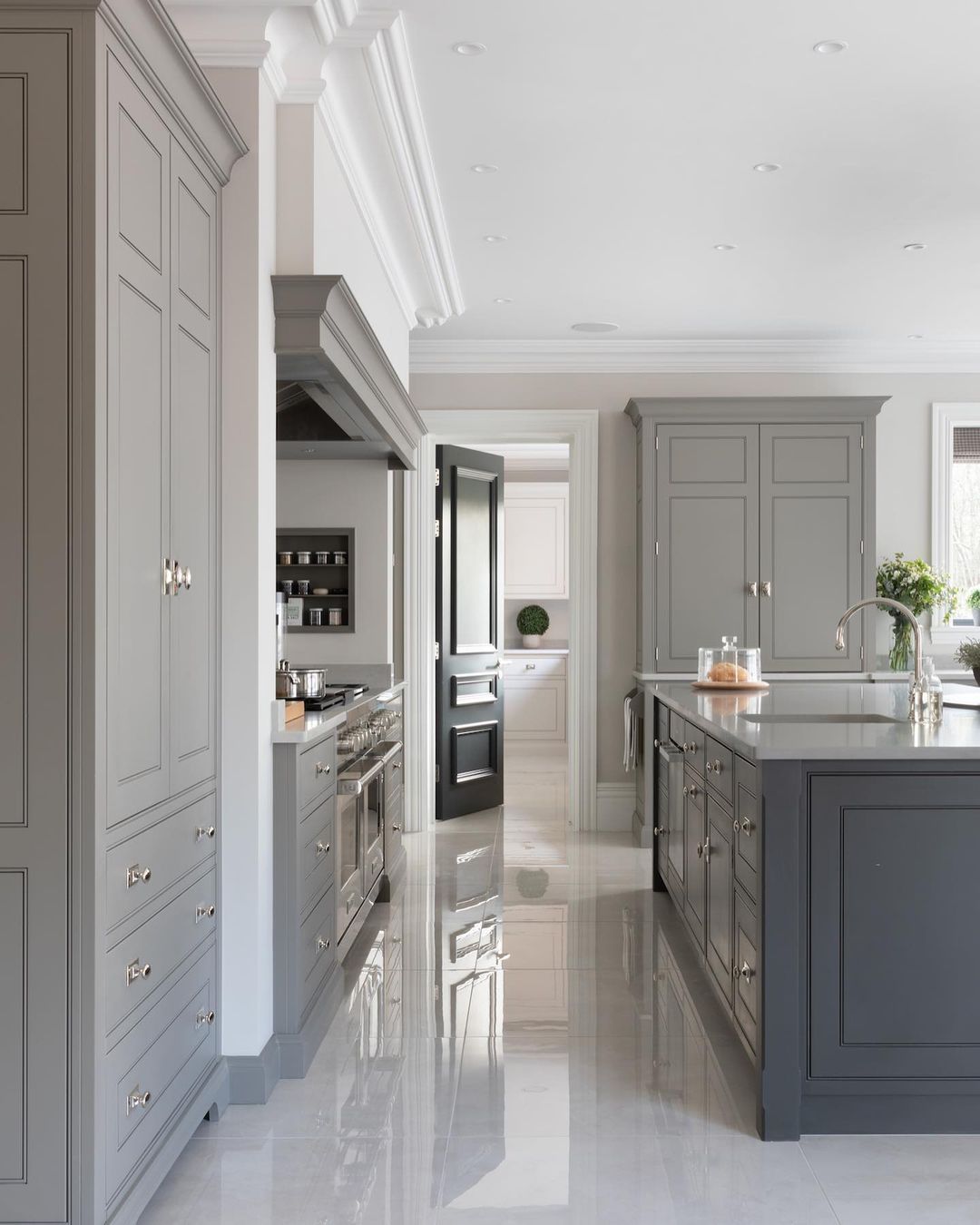 Dark Grey Kitchen with Reflective Surfaces