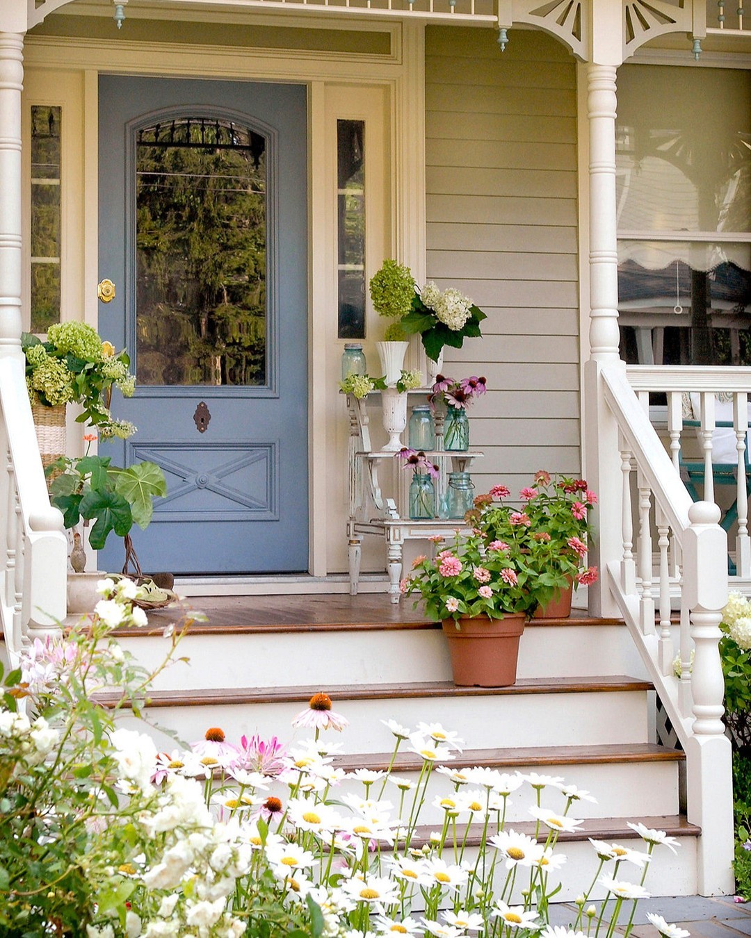 Dark Wood Steps at the Front Porch with a Sturdy Railing