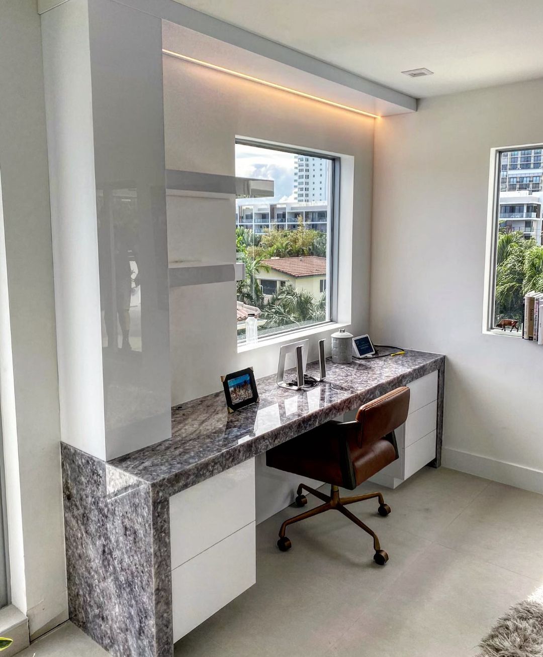 Desk Near a Window with a Modern Marble Surface