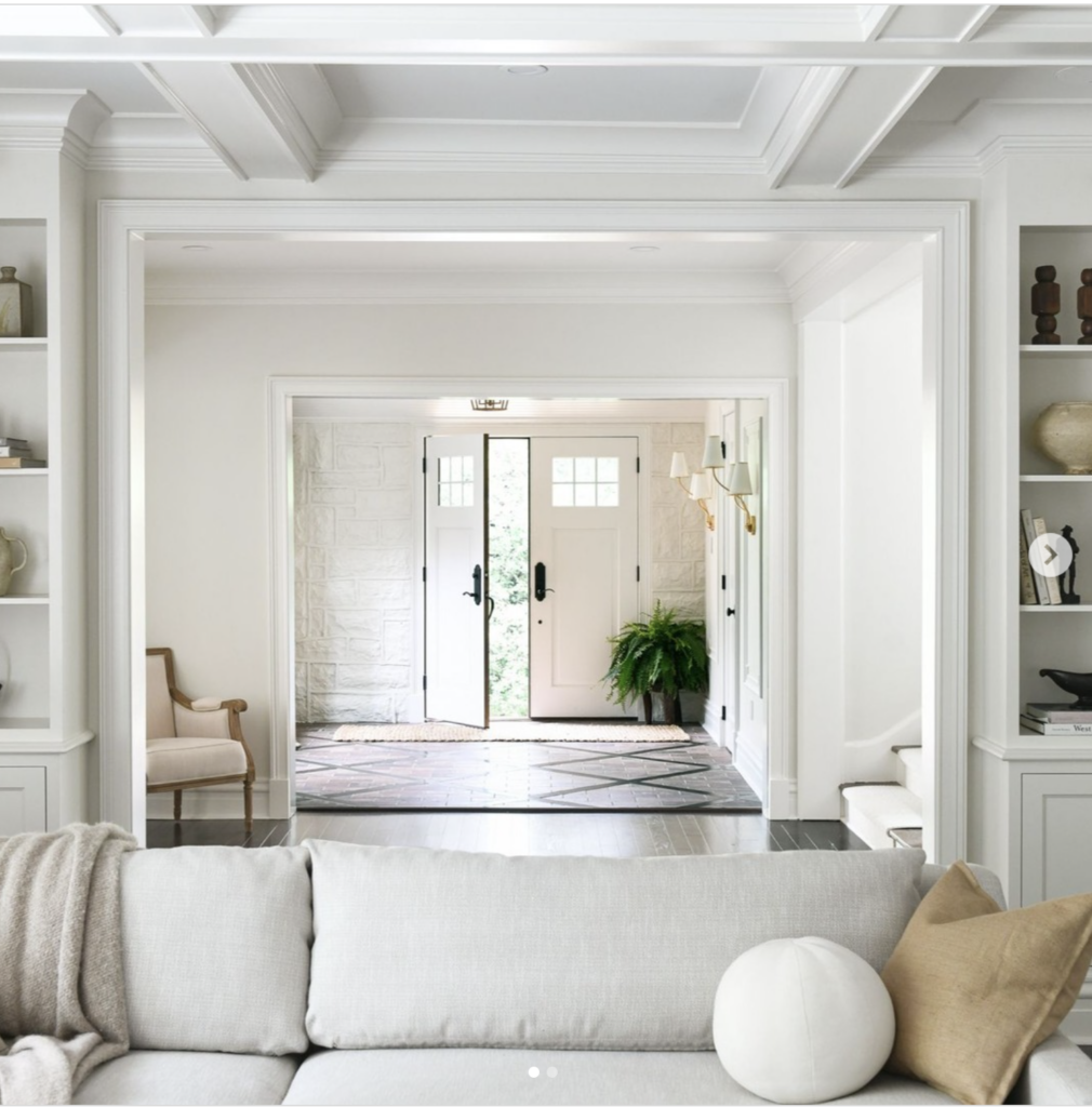 Double White Front Door and Gray Couch