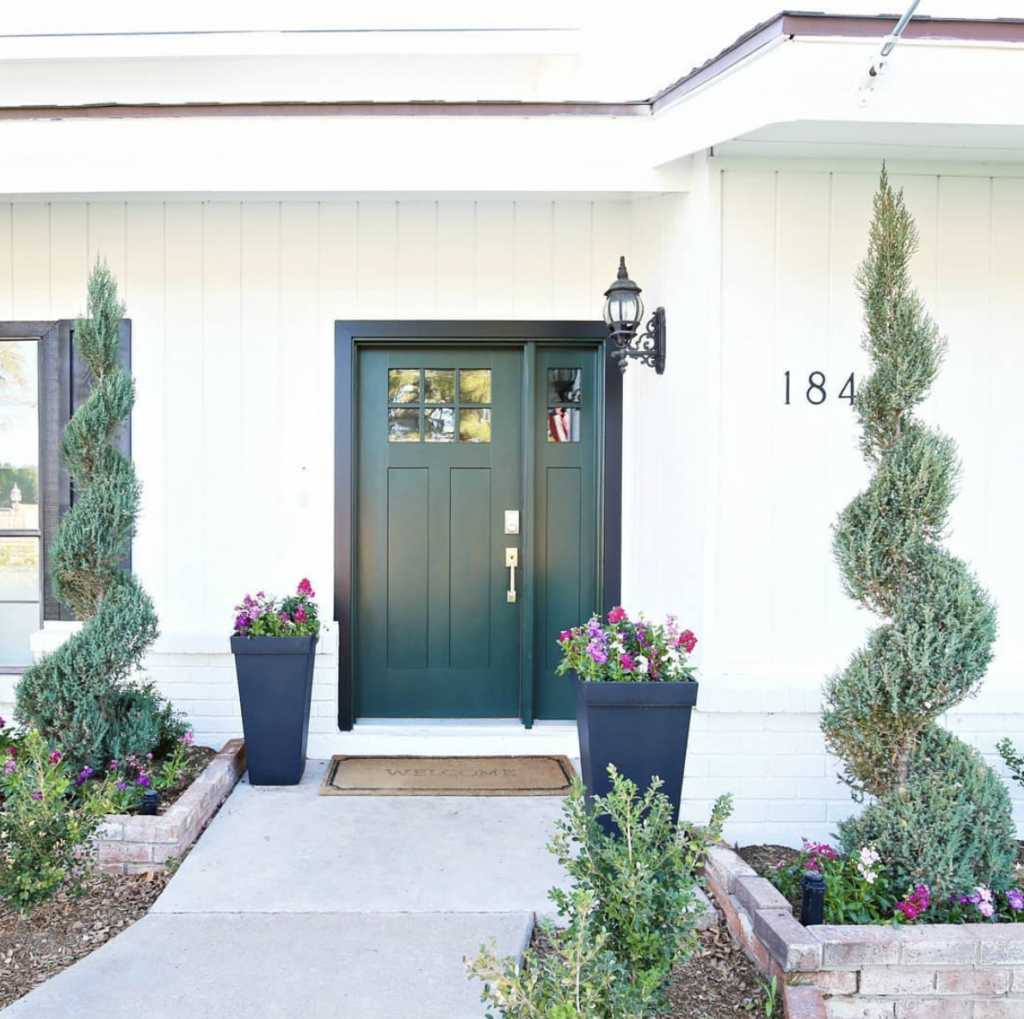 Emerald Green Entrance Door on a White House