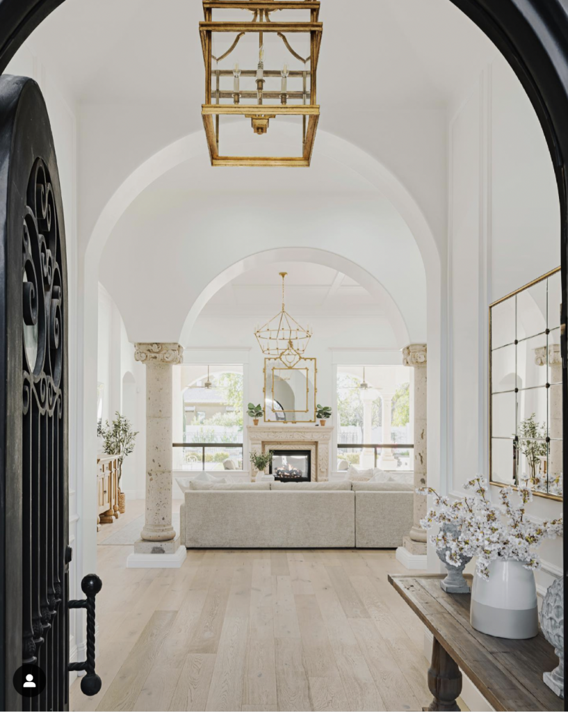 Entryway Chandelier and Black Front Door